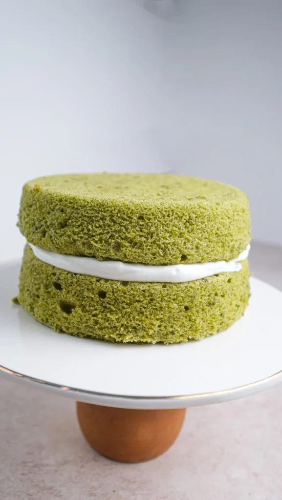 matcha cake with whipped cream layered 