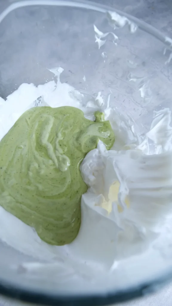 Matcha cake batter is added to the remaining whipped eggs 