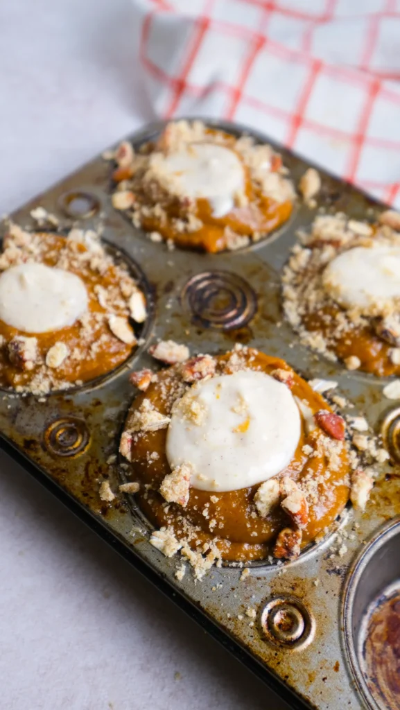 Pumpkin cream cheese muffins cream cheese assembled and ready to bake 