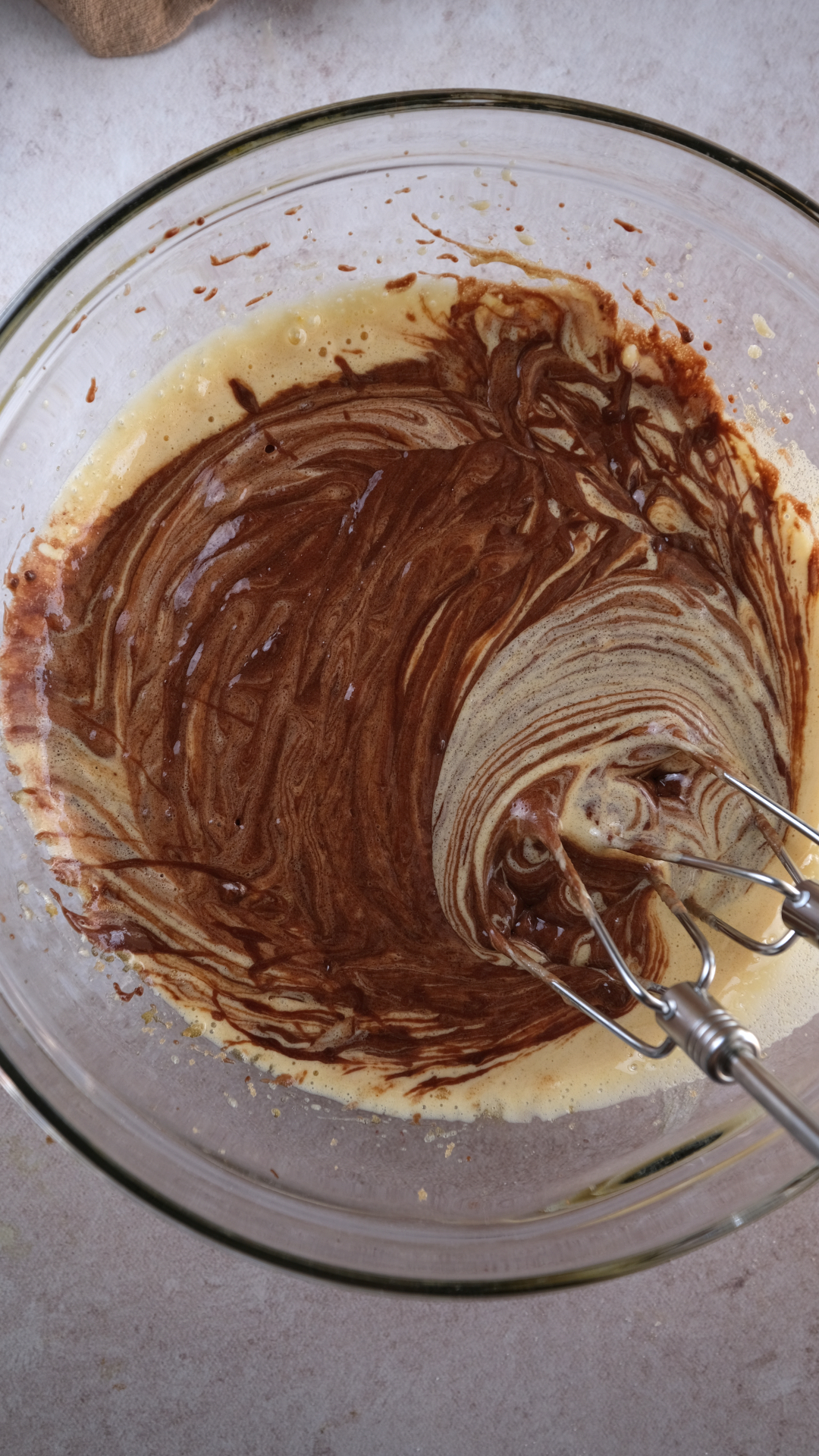 biscoff brownies add chocolate to egg mix