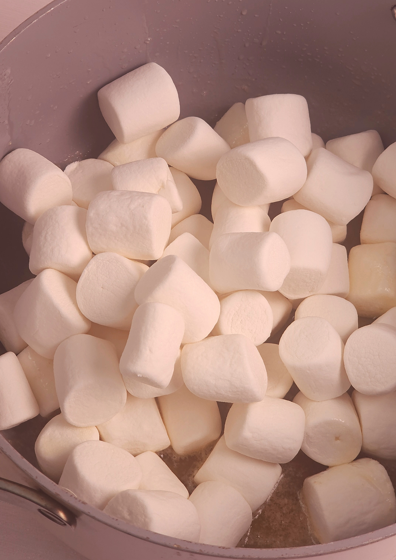 add marshmallows to butter