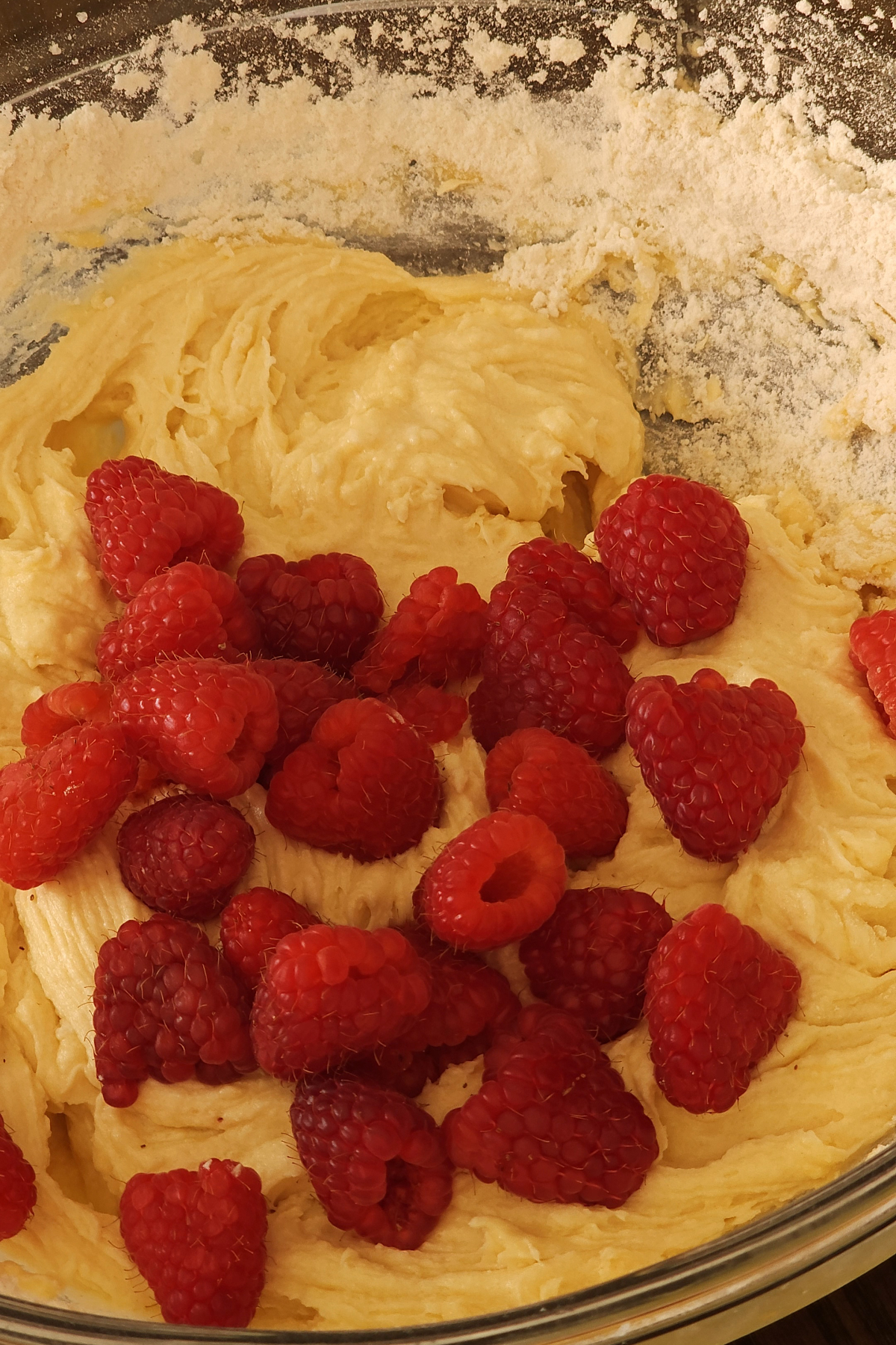 Fold in fresh raspberries
