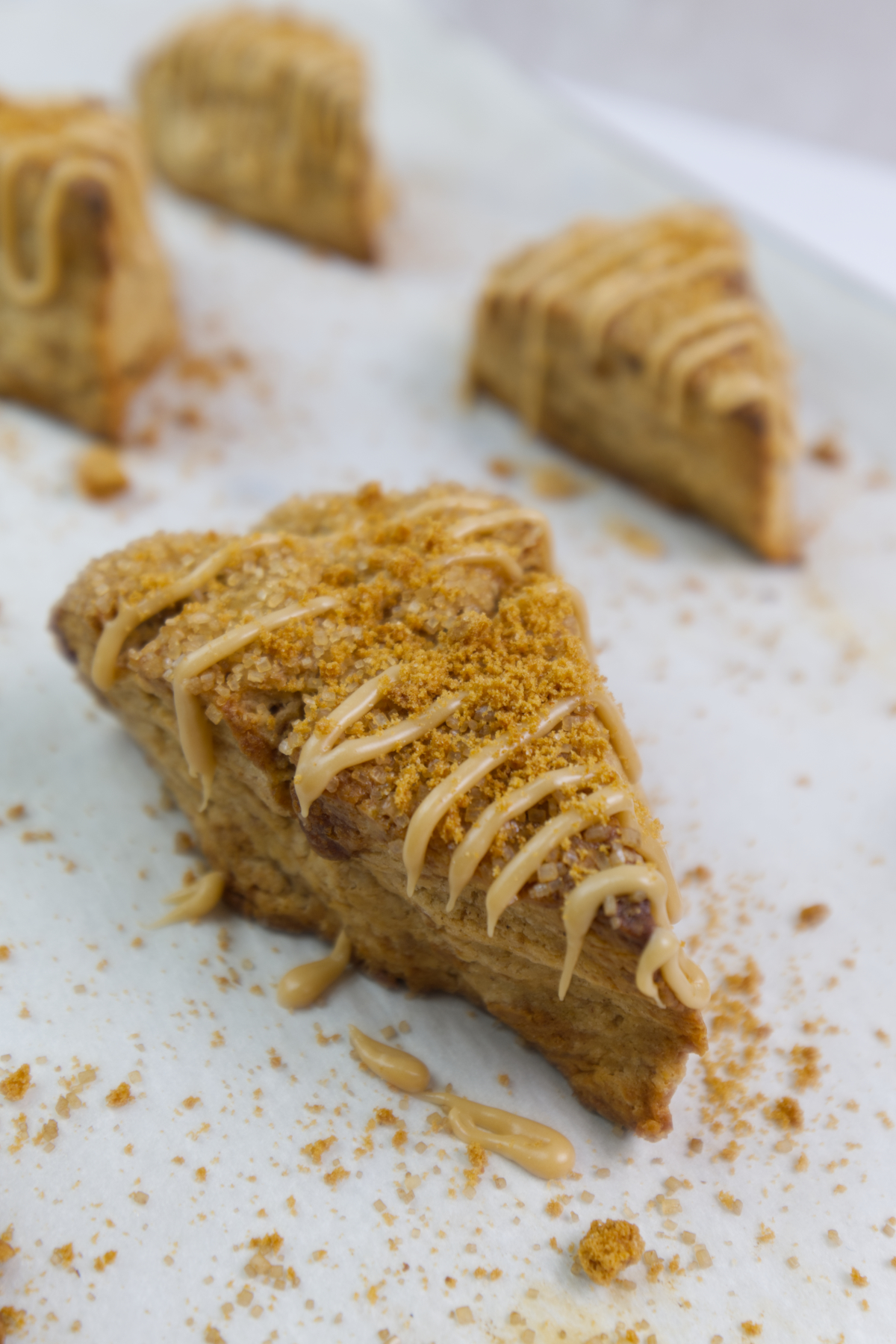 baked biscoff scone with biscoff glaze