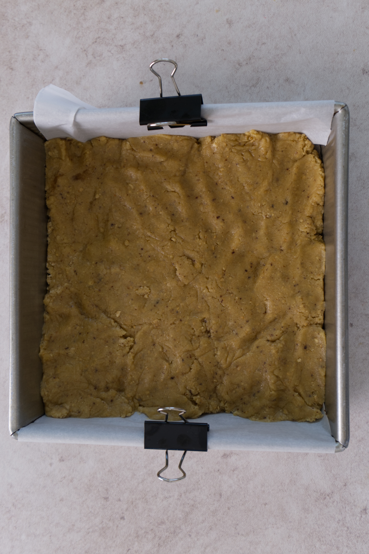 brown butter dough pressed into baking pan