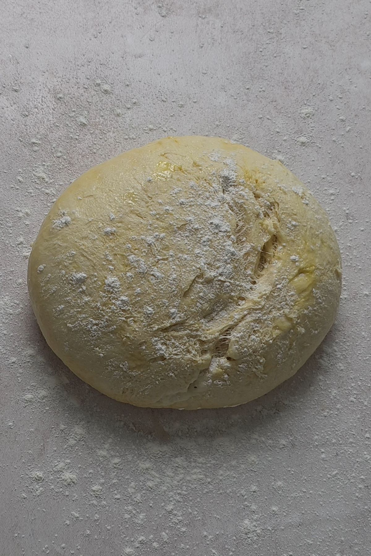 dough gets put on floured surface