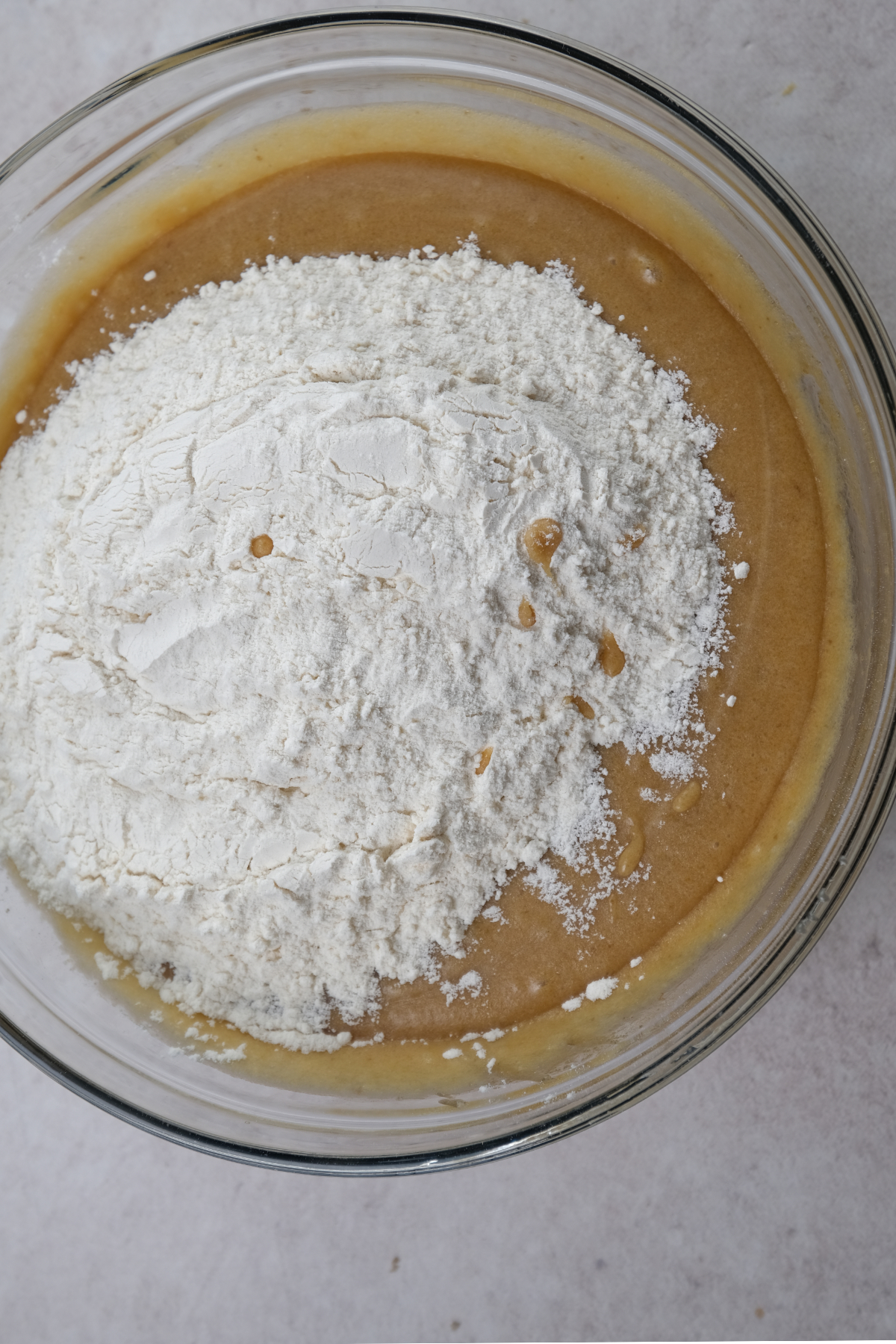 add dry ingredients to wet