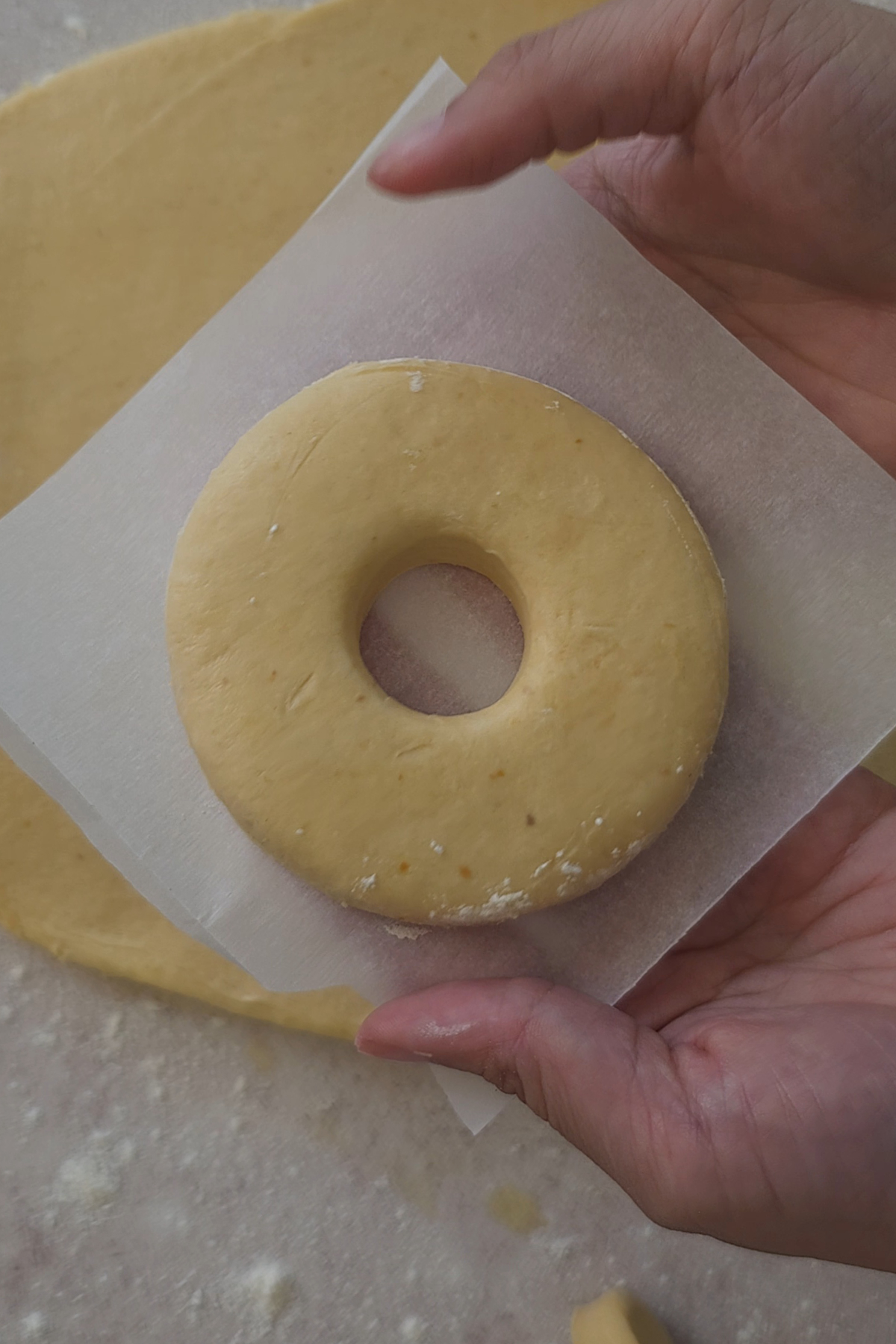 punching out dough ring
