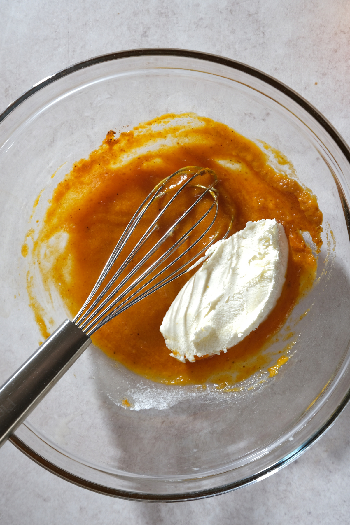 add the mascarpone to the egg yolk and pumpkin mixture