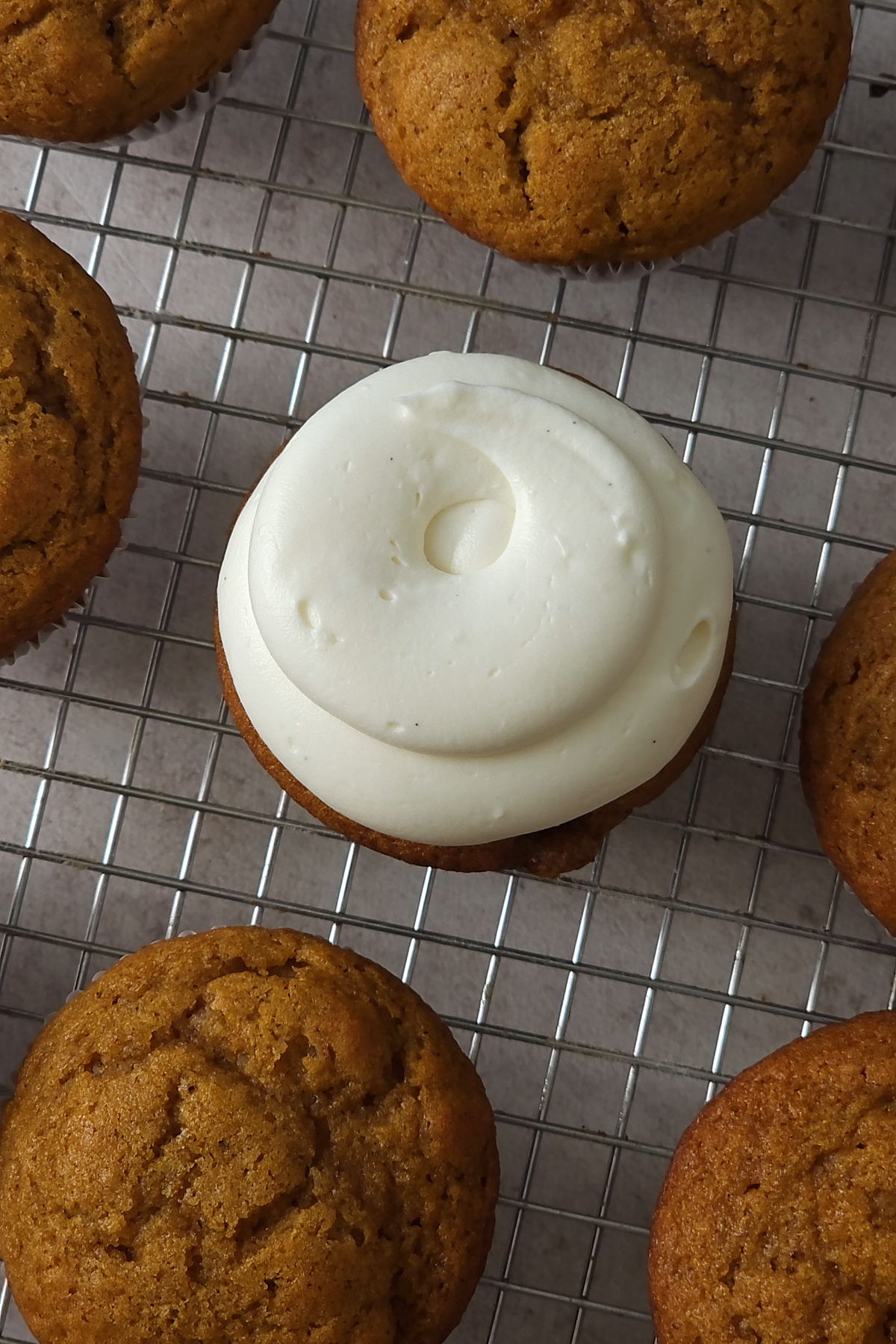whipped cream cheese frosting on cupcake