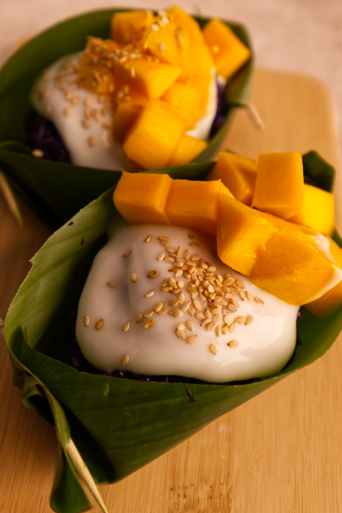 ube mango sticky rice on banana boat
