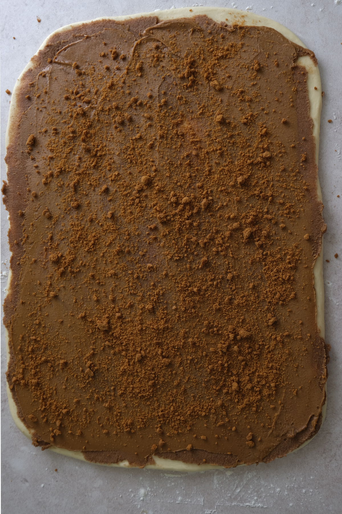 Add biscoff crumbles on top of the spiced filling