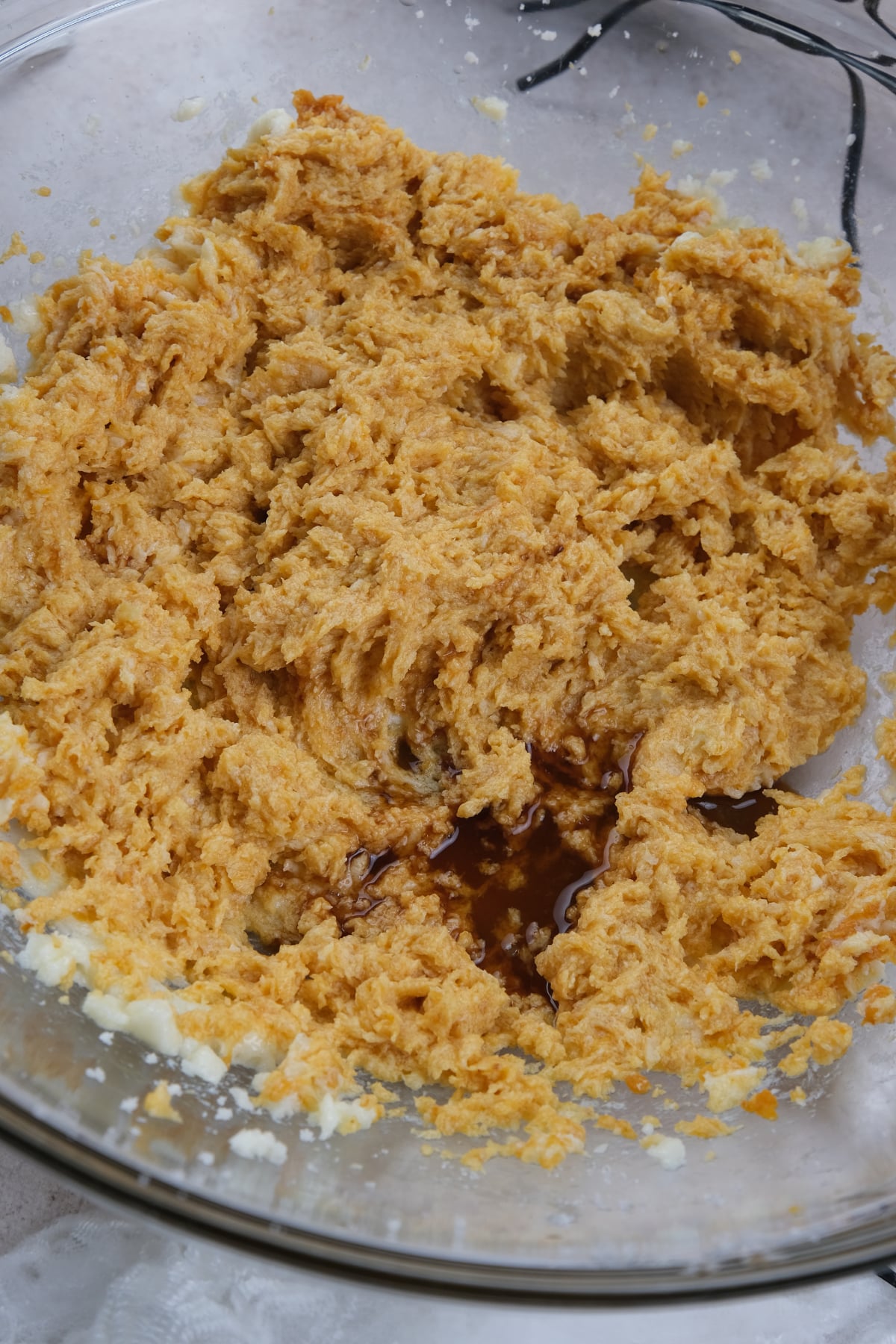 wet ingredients mixed in glass bowl
