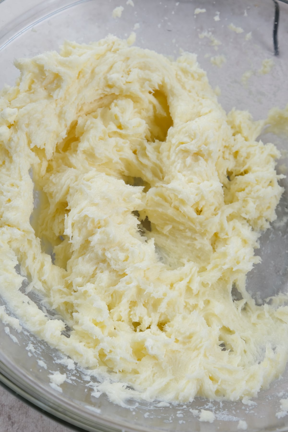 cream cheese and butter whipped in glass bowl