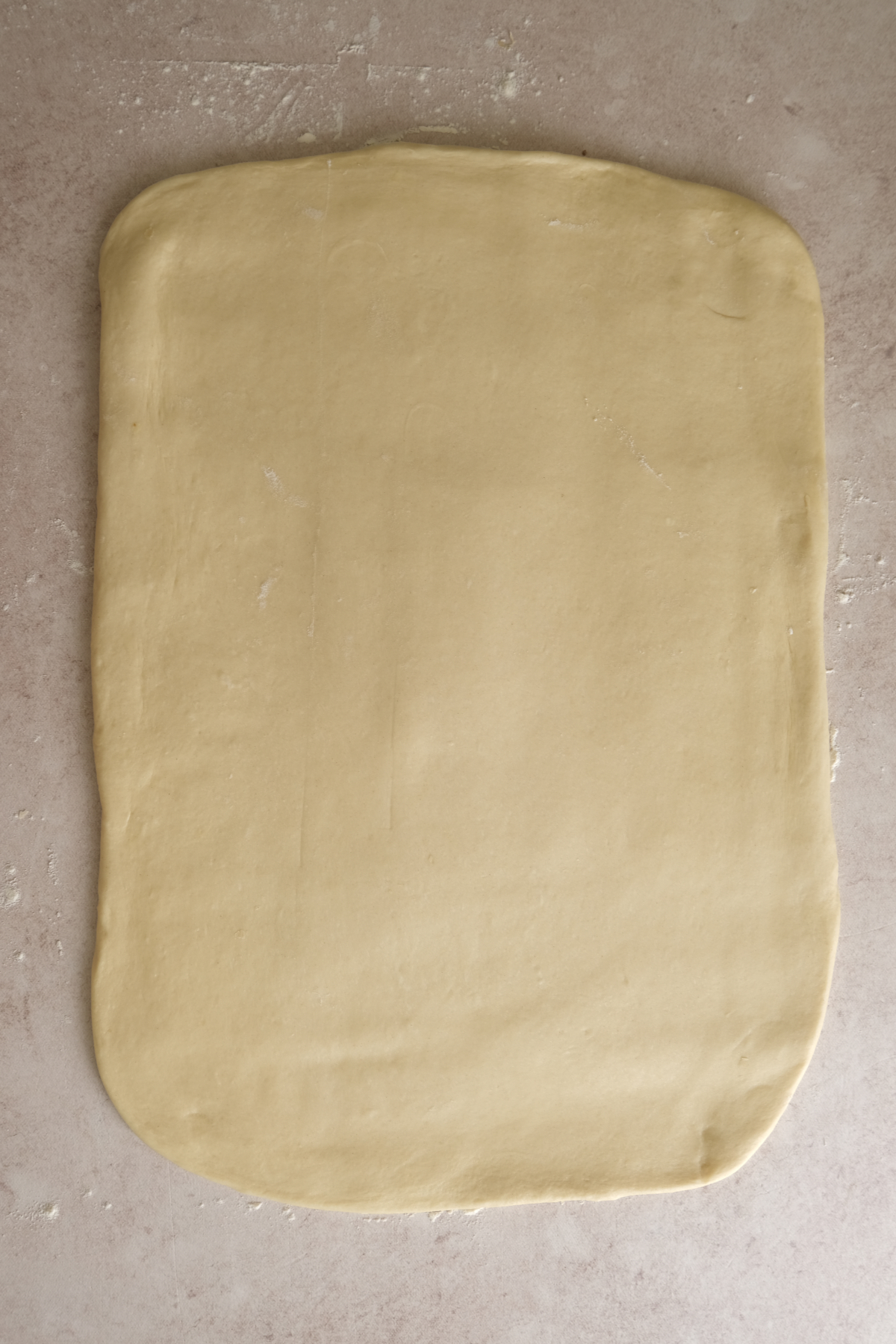 biscoff cinnamon roll dough rolled out